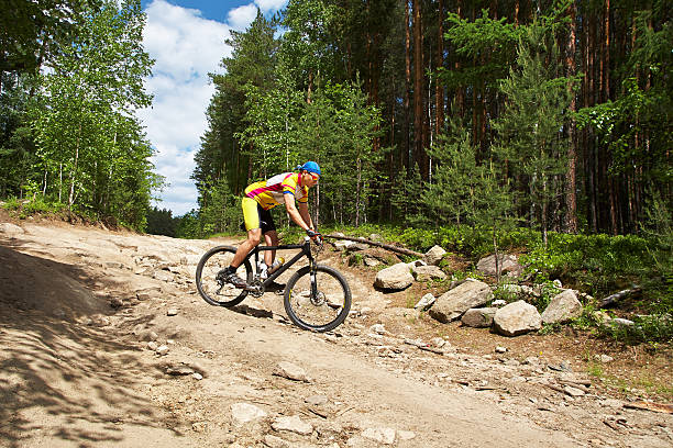 istock man riding a mountain bike 510695384