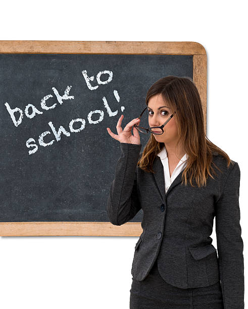 istock Teacher in front of blackboard 510695877