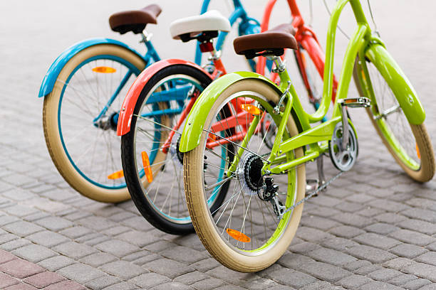 istock Three beautiful lady city bikes 510696442
