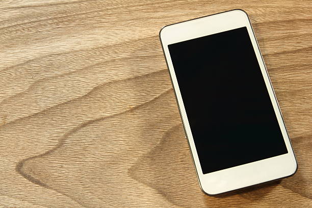 istock Smartphone on the wood 510696622