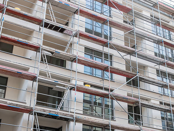 istock New Apartment Building Covered with Scaffolding 510697176