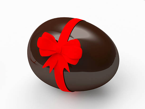 istock Chocolate Easter egg with red ribbon and bow 510697336
