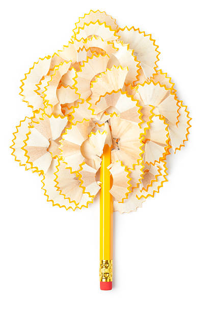 Pencil and shavings in tree shape on white. This file is cleaned, retouched and contains clipping path.
