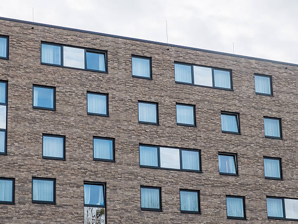 istock Low Rise Brick Apartment Building with Windows 510697848