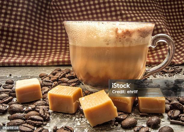 Salted Caramel Latte With Caramel Coffee Beans And Sea Salt Stock Photo - Download Image Now