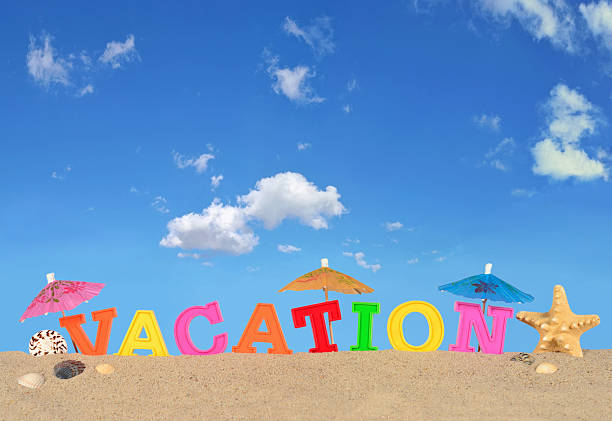 istock Vacation letters on a beach sand 510700530