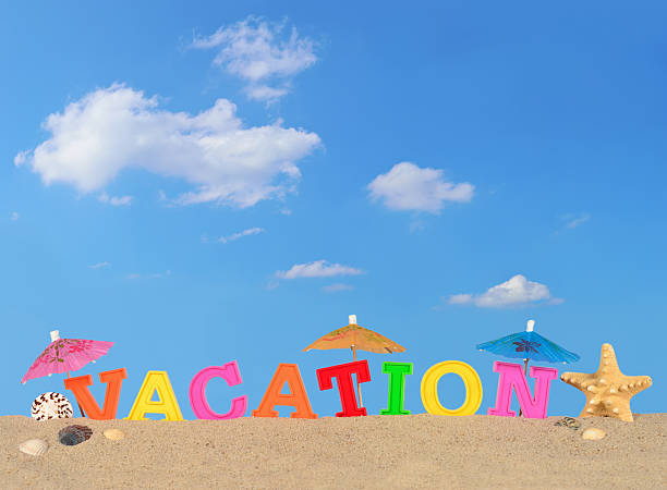 istock Vacation letters on a beach sand 510700808