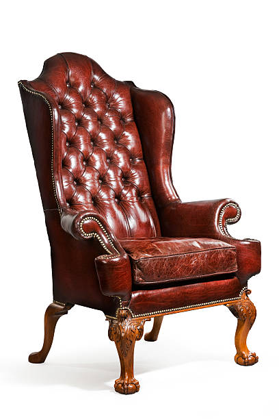 istock antique leather wing chair carved legs isolated 510701804