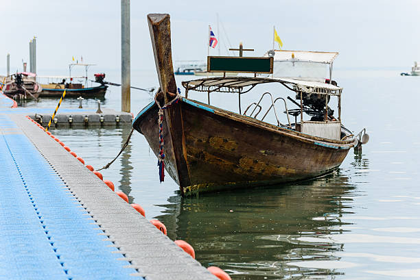 istock Longtail boat park at floating pier 510703974