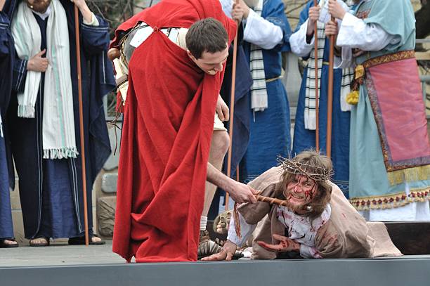 Jesus falls on the Cross stock photo