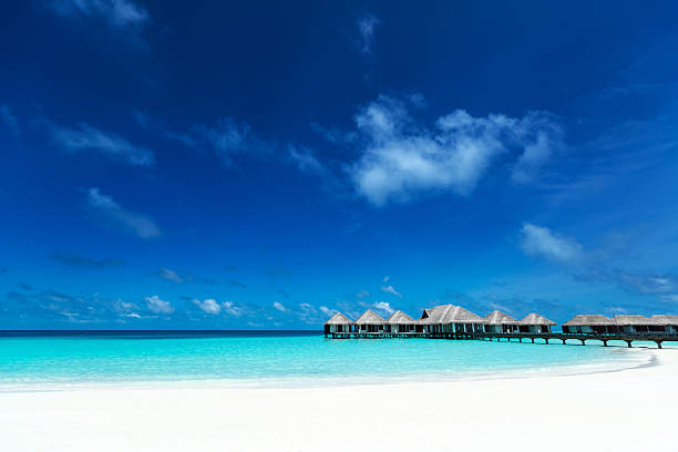 istock Beautiful beach with water bungalows at Maldives 510719239