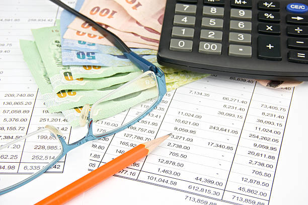 istock Pile bill with calculator pencil and spectacles 510720059