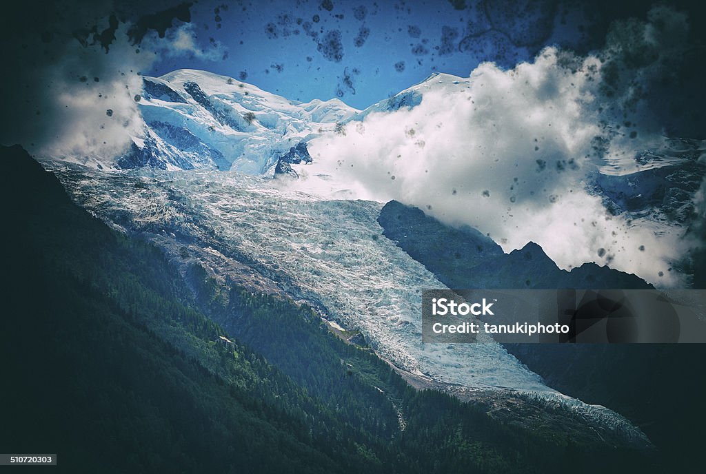 Mont Blanc Cross-processed, scratched image of Mont Blanc and the impressive Bossons Glacier seen from Chamonix. Mount Blanc Massif. Haute-Savoie. Rhone-Alpes. France. Bossons Glacier Stock Photo