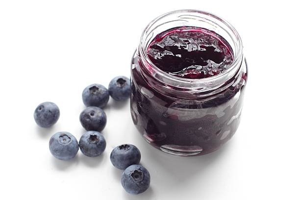 Glass with Blueberry Jam and fresh fruits