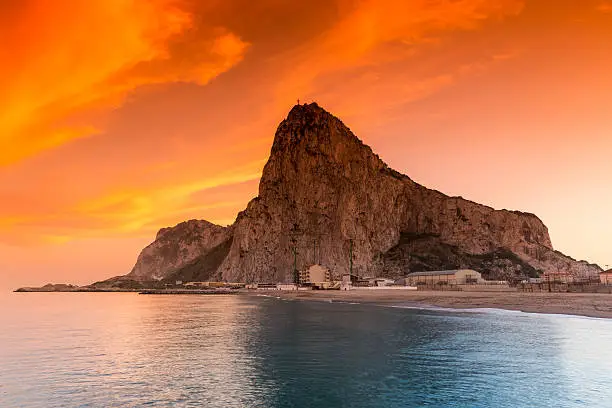 The rock of Gibraltar seen from the bayside at sunset
