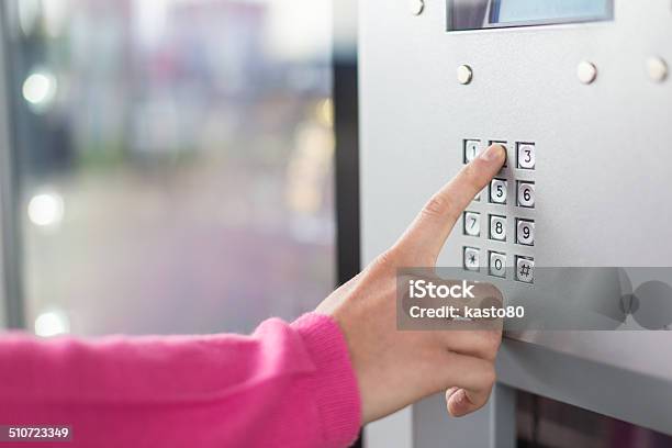 Womens Hand Using A Dial Pad Stock Photo - Download Image Now - Bank Teller, Coffee Maker, Ticket