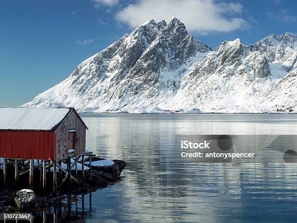 Lofoten Islands Rorbu And Snow Covered Landscape Stock Photo - Download Image Now - Beach, Built Structure, Coastline