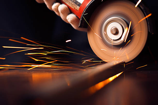 istock Red hot sparks at grinding steel material 510724041