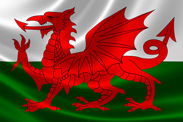 Welsh Flag 3D rendering of the flag of Wales on satin texture. welsh flag stock pictures, royalty-free photos & images
