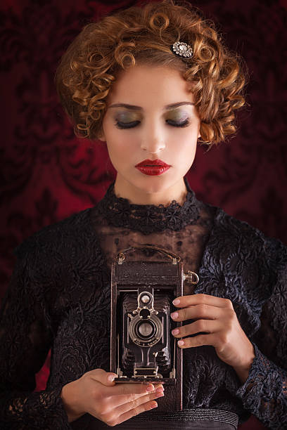 istock vintage photographer woman 510726211