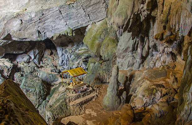 istock Pavilion buddha in the deep cave at Laos, 510726875