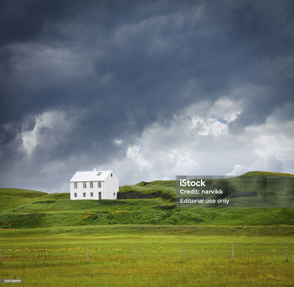 House and landscape at South Iceland Dyrholaey, Iceland - June 13, 2014: Lonely house in south Iceland landscape Agricultural Field Stock Photo