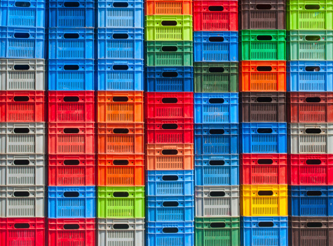 colorful plastic boxes stacked one upon the other