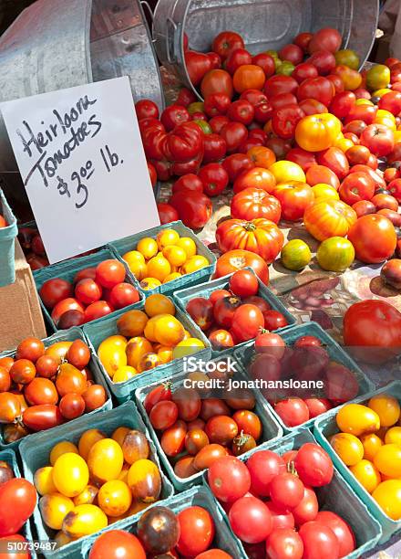 Heirloom Tomatos At A Farmers Market With Price Sign Stock Photo - Download Image Now