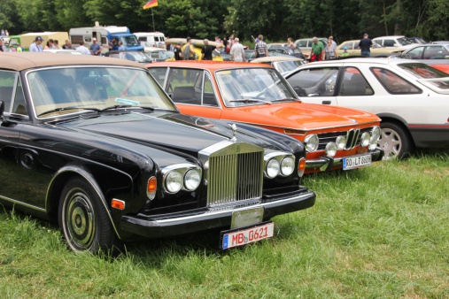 Bad Aibling, Germany - June 19, 2014: Rolls Royce on Bavaria Historic meeting in Bad Aibling / Bavaria. Here is organized every year a vintage car rally. The car is built 1962. The visitors marvel at the beautiful cars.