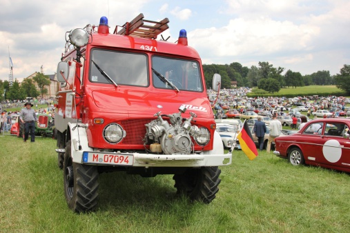 Bad Aibling, Germany - June 19, 2014: Oldtimer fire truck on Bavaria Historic meeting in Bad Aibling / Bavaria. Here is organized every year a vintage car rally. The visitors marvel at the beautiful cars.