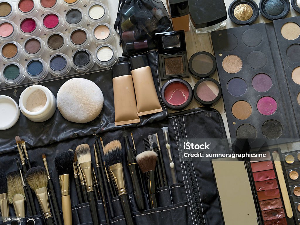 Professional makeup Photo of a set of makeup, applicators and brushes from a professional makeup artist. Artist's Palette Stock Photo