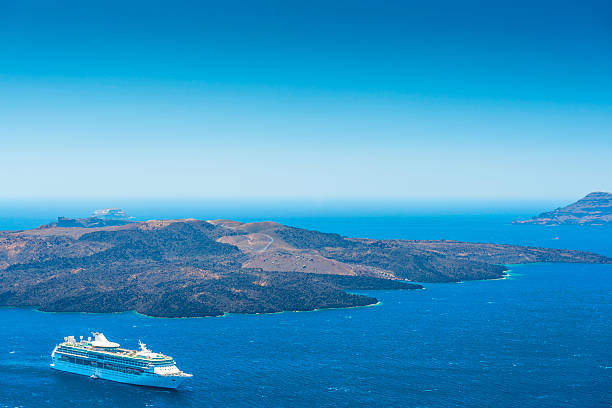 Cruise Ship Near Volcano On Island of Santorini
