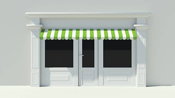 istock Sunny Shopfront with large windows White store facade 510763659