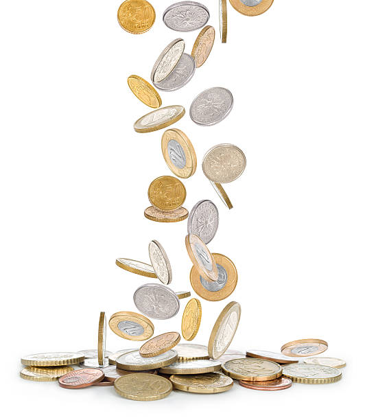 istock Heap of coins falling to the ground 510765919