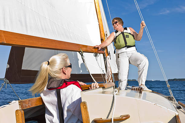 istock Two Women Crew a Sailboat on Mahone Bay, Nova Scotia. 510767659