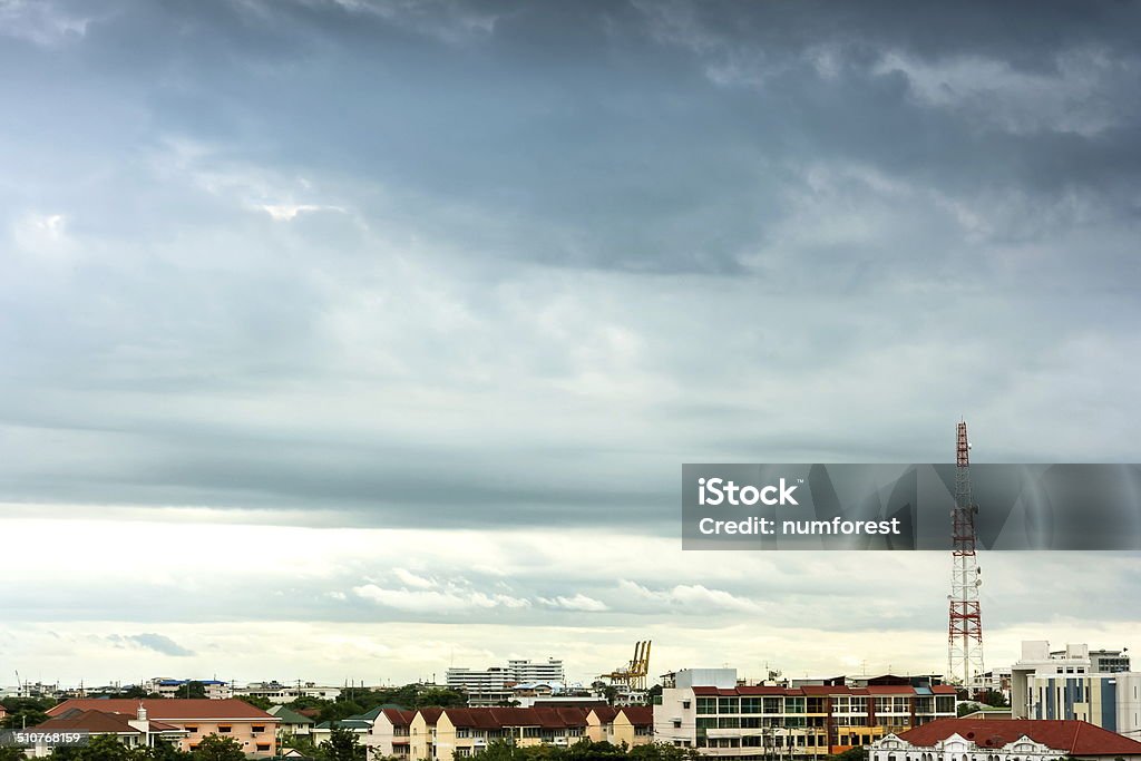 Thunderstorms and communication towers Thunderstorms are covering the city Aerial View Stock Photo