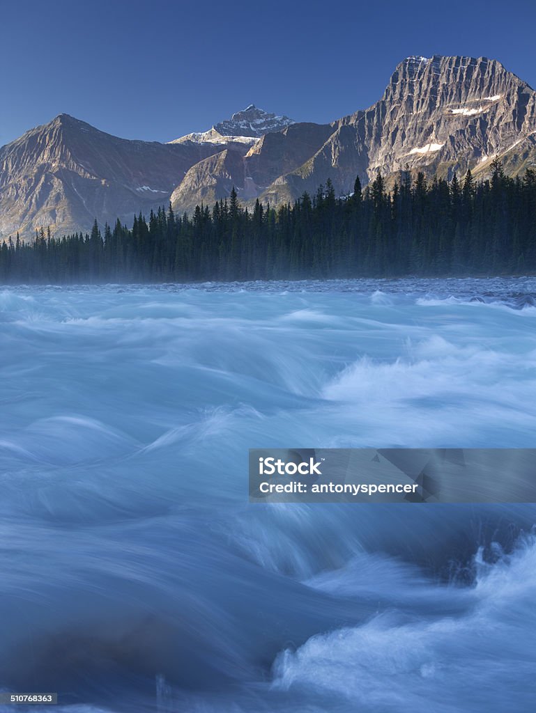 Athabasca River and Mountain at dawn in the Canadian Rockies Athabasca River and mountain at dawn in the Canadian Rockies Alberta Stock Photo