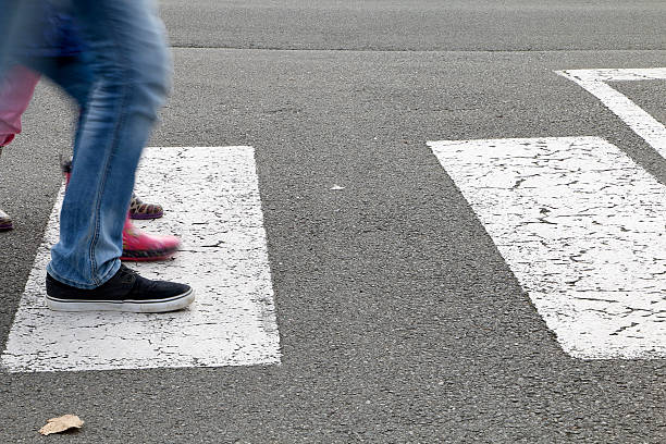 istock Street - children crossing a crosswalk 510775772