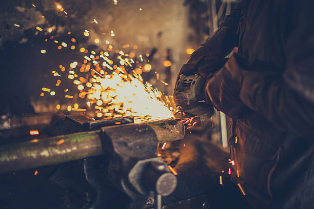 Grinding with sparks Grinding with sparks oxyacetylene stock pictures, royalty-free photos & images