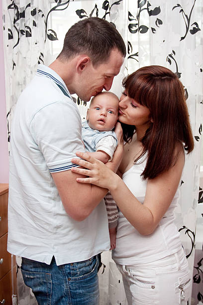 istock Baby with parents 510776064