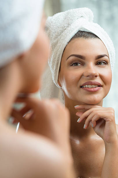 istock Woman admiring herself in mirror 510777658