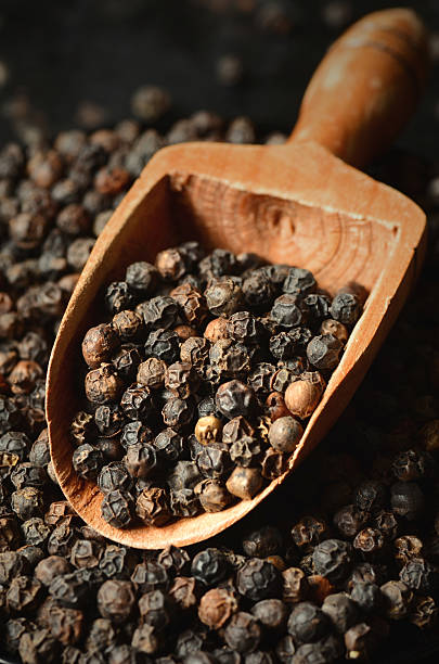 istock Close-up of black peppercorns 510778792