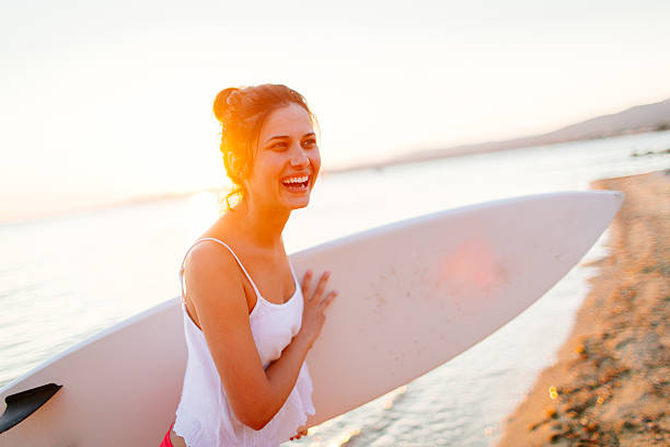 Smiling surfer girl