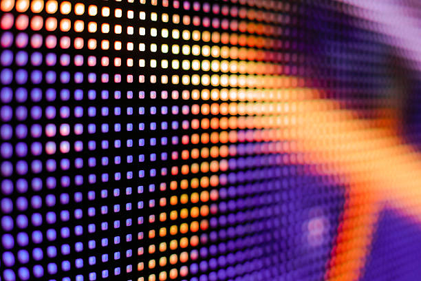 Colored purple and yellow LED smd screen Colored purple and yellow LED smd screen with lines - close up background coming out of computer screen stock pictures, royalty-free photos & images