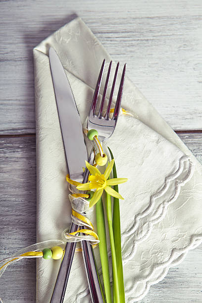 istock cutlery for holiday dinner with daffodils 510782844