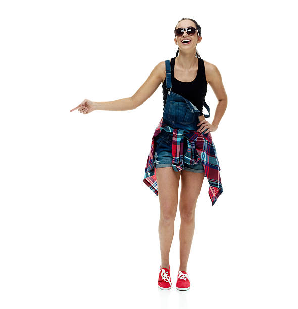 istock Cheerful female pointing away 510784002