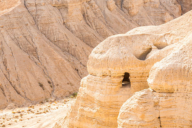 Cave in Qumran, where the dead sea scrolls were found Cave in Qumran, where the dead sea scrolls were found, Israel dead sea scrolls stock pictures, royalty-free photos & images