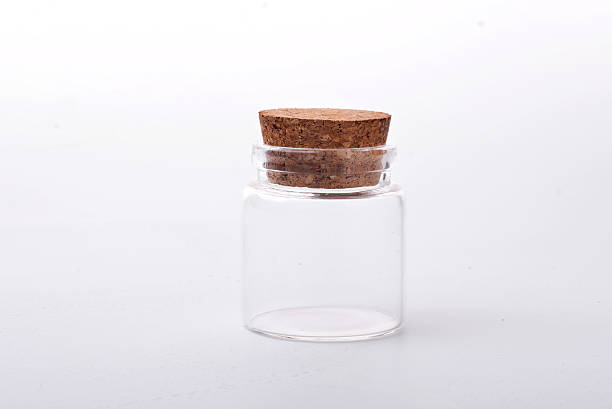 istock Empty little bottles with cork stopper isolated on white 510785696