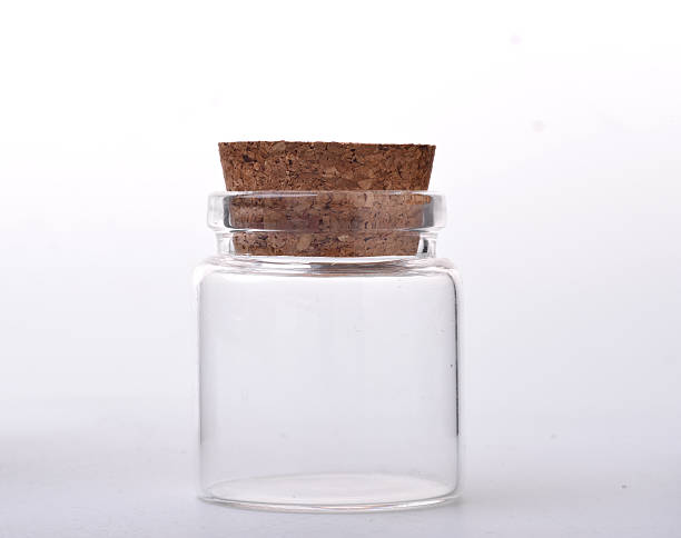 istock Empty little bottles with cork stopper isolated on white 510785760