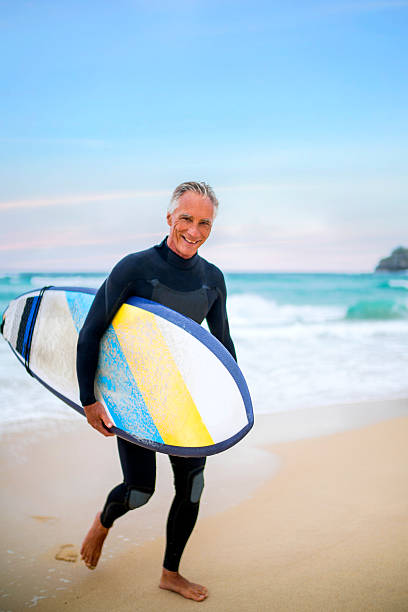 Senior Man and Surf Board